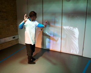 young person experimenting with a telepresence screen